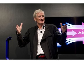 FILE - In this Wednesday, Sept., 14, 2011 file photo, Inventor James Dyson launches the Dyson DC41 Ball vacuum and the Dyson Hot heater fan on in New York. Dyson, the British company best known for innovative vacuum cleaners, has said on Tuesday, Oct. 23, 2018 it will build its electric car in Singapore. The company says the bespoke manufacturing facility is due for completion in 2020 and is part of a 2.5 billion pound ($3.2 billion) investment in new technology globally.