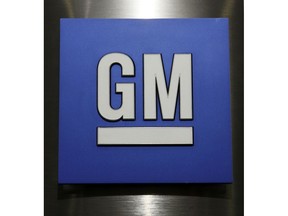 FILE - This Jan. 25, 2010, file photo, shows a General Motors Co. logo during a news conference in Detroit.  General Motors says it will ask the federal government for one national gas mileage standard, including a requirement that a percentage of auto companies' sales be zero-emissions vehicles. Mark Reuss, GM's executive vice president of product development, said the company will propose that a certain percentage of nationwide sales be made up of vehicles that run on electricity or hydrogen fuel cells.