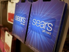 Sears gift cards are displayed at a store in Hackensack, N.J., Monday, Oct. 15, 2018. Sears filed for Chapter 11 bankruptcy protection Monday, buckling under its massive debt load and staggering losses.