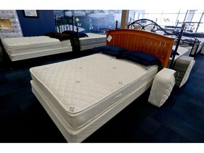 FILE- In this April 11, 2018, file photo, a selection of mattresses are available for sale at a bedding store in Cranberry Township, Pa. On Thursday, Oct. 25, the Commerce Department releases its September report on durable good.