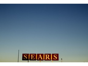 FILE- In this Oct. 16, 2018, file photo a sign for a Sears appliance outlet store is displayed in Kansas City, Mo. Since filing for Chapter 11 bankruptcy, Sears Holdings Corp. has been trying to convince suppliers to keep shipping it merchandise by touting the $300 million in financing it has secured so that its business can continue operating through the holidays. But a growing number of manufacturers who themselves got hurt or watched others get burned by Toys R Us' quick demise are still nervous.