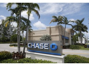 FILE - This Aug. 17, 2016, file photo, shows a Chase bank branch in North Miami Beach, Fla. JPMorgan Chase & Co. reports earnings Friday, Oct. 12, 2018.