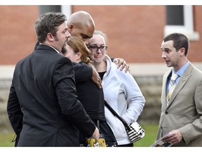 Friends and family attend a funeral Mass for eight of the 20 people killed in last Saturday's fatal limousine crash in Schoharie, N.Y., during a memorial service at St. Stanislaus Roman Catholic Church in Amsterdam, N.Y., Saturday, Oct. 13, 2018.