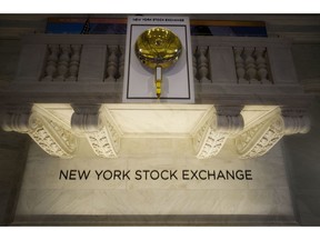 FILE- In this May 10, 2018, file photo, the opening bell hangs above the trading floor at the New York Stock Exchange. The U.S. stock market opens at 9:30 a.m. EDT on Friday, Oct. 5.