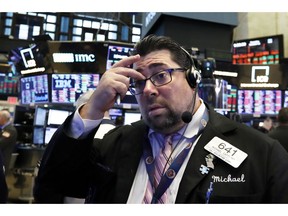 Trader Michael Capolino works on the floor of the New York Stock Exchange, Thursday, Oct. 11, 2018. The market's recent decline was set off by a sharp drop in bond prices and a corresponding increase in yields last week and early this week.