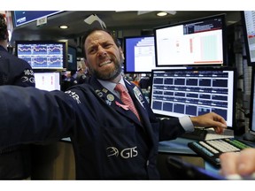 Specialist Michael Pistillo works on the floor of the New York Stock Exchange, Tuesday, Oct. 23, 2018. Stocks are opening sharply lower on Wall Street following big drops in Asia and Europe.