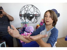 In this Aug. 30, 2018, photo Gabriel, 12, plays with an Air Hogs Supernova quadcopter at the Walmart Toy Shop event in New York. Walmart says 30 percent of its holiday toy assortment will be new. It will also offer 40 percent more toys on Walmart.com from a year ago. In November and December, the company's toy area will be rebranded as "America's Best Toy Shop."