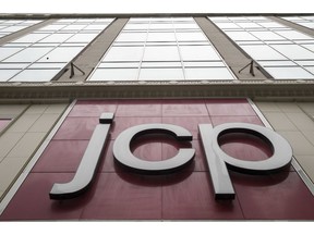 FILE - In this May 16, 2018, photo, the J.C. Penney logo hangs outside the Manhattan Mall in New York. J.C. Penney has named Jill Soltau, who most recently served as president and CEO of fabric and crafts chain Jo-Ann Stores, to be its next CEO, effective Oct. 15, 2018.
