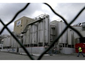 FILE - This Dec. 11, 2017 file picture shows a general view of the Lactalis plant and milk production site in Craon, western France. Dairy giant Lactalis has firmly denied claims made by a French investigative newspaper that it sold 8,000 tons of milk powder contaminated with salmonella.