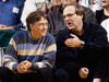 Microsoft Chairman Bill Gates, left, chats with Portland Trail Blazers owner and former business partner Paul Allen during aTrail Blazers game, March 11, 2003.