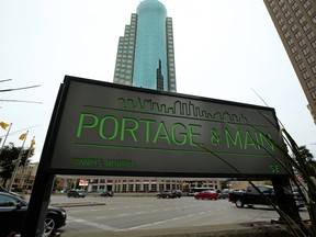 Traffic crosses Main Street at Portage Avenue in Winnipeg. Being “on the street” is not a necessary precondition for success as an investor.