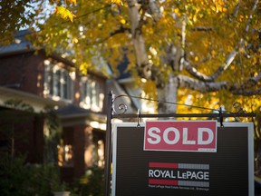 Purchasing homes and paying off mortgages are getting harder in Toronto due to a combination of rising interest rates, higher home prices and tougher standards to qualify for a mortgage.