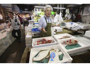 In this Sept. 26, 2018, photo, Tai Yamaguchi of fish wholesaler Hitoku Shoten, speaks during an interview with the Associated Press at Tsukiji fish market in Tokyo. Japan's famed Tsukiji fish market is closing down on Saturday, Oct. 6, 2018 after eight decades, with shop owners and workers still doubting the safety of its replacement site. "If the new place were better, I'll be happy to move," said Yamaguchi. Yamaguchi feels it has been mishandled by authorities who failed to fully consult those affected.