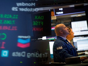 A trader works on the floor of the New York Stock Exchange (NYSE) in New York, U.S., on Monday, Oct. 29, 2018.