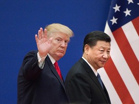 U.S. President Donald Trump and China's President Xi Jinping leaving a business leaders event at the Great Hall of the People in Beijing in Nov. 9, 2017.