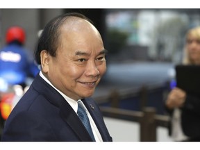 Vietnam's Prime Minister Nguyen Xuan Phuc arrives for an EU-ASEM summit in Brussels, Friday, Oct. 19, 2018. EU leaders meet with their Asian counterparts Friday to discuss trade, among other issues.