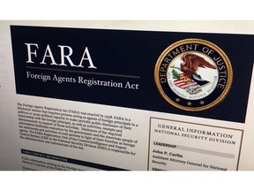 FILE - In this Aug. 18, 2016, file photo, a portion of the website for the website fara.gov, on the Foreign Agents Registration Act, is seen photographed in Washington. A push to give the Justice Department more enforcement authority over the lucrative and at times shadowy world of foreign lobbying is stalled amid opposition from pro-business groups, nonprofits and privacy advocates.