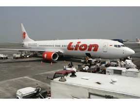 FILE - In this May 12, 2012 file photo, a Lion Air passenger jet is parked on the tarmac at Juanda International Airport in Surabaya, Indonesia. Indonesia's Lion Air said Monday, Oct. 29, 2018, it has lost contact with a passenger jet flying from Jakarta to an island off Sumatra.