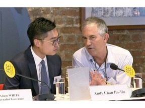 In this Aug. 14, 2018, image made from a video, The Financial Times Asia news editor, Victor Mallet, right, speaks with Andy Chan, founder of the Hong Kong National Party, during a luncheon at the Foreign Correspondents Club in Hong Kong. The Financial Times said Friday, Oct. 5, 2018 that Hong Kong's government has refused to renew the work visa of Mallet, in what human rights activists say is the latest sign of a deteriorating human rights situation in the semi-autonomous Chinese territory. (Pool video via AP)