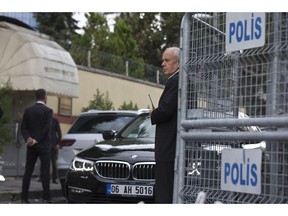Security personnel stand at the entrance of Saudi Arabia's consulate in Istanbul, Friday, Oct. 12, 2018. Germany says it is "very concerned" about the disappearance of Saudi writer Jamal Khashoggi in Istanbul, and is calling on Saudi Arabia to "participate fully" in clearing up reports that he may have been killed. Khashoggi went missing over a week ago after entering the Saudi consulate in Istanbul.