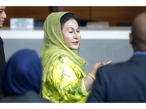 Rosmah Mansor, wife of Malaysian Prime Minister Najib Razak, arrives at the Anti-Corruption Agency for questioning in Putrajaya, Wednesday, Oct. 3, 2018. Rosmah is to be questioned by the country's anti-graft agency for the third time as investigators prepare possible charges against her including money laundering in the multi-billion-dollar scandal.
