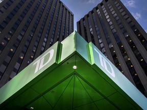Toronto-Dominion Bank on Thursday reported a 20 per cent rise in fourth-quarter earnings.