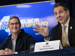 John Schoettler, vice-president for global real estate at Amazon, dressed casually contrasts with New York Governor Andrew Cuomo's formal attire at the Amazon announcement. Is this indicative of the power balance in this game?