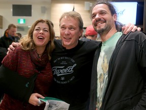 Canopy Growth co-CEO Bruce Linton, centre, at the opening of a Tweed cannabis store in New Brunswick.