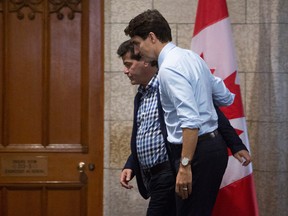 Prime Minister Justin Trudeau and Unifor National President Jerry Dias make their way to a meeting on Parliament Hill in Ottawa.