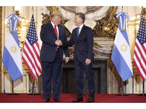 President Donald Trump with Argentina's President Mauricio Macri during their meeting at Casa Rosada, Friday, Nov. 30, 2018 in Buenos Aires, Argentina.
