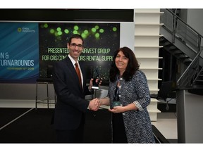 Beth Maliakkal, Chief Financial Officer, Imperial Capital, presents the 2018 Regional Impact Award to Mitch Green, Managing Director, Clairvest Group.