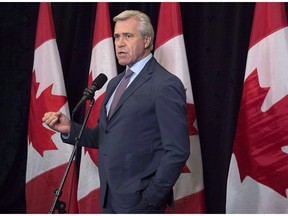 Newfoundland and Labrador Premier Dwight Ball talks with reporters as the Liberal cabinet meets in St. John's, N.L., on September 12, 2017.THE CANADIAN PRESS/Andrew Vaughan