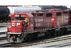 Canadian Pacific Railway locomotives are shuffled around a marshalling yard in Calgary, Wednesday, May 16, 2012. Canadian Pacific Railway says it delivered record shipments of grain and biofuels in October.