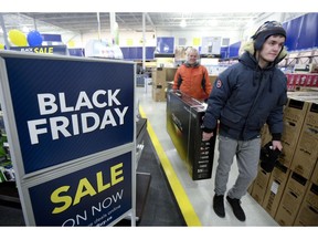 As Canadians go head-to-head with consumers vying to snatch up deep discounts this Black Friday, their beloved shopping holiday is facing a competitor of its own. Weeks before North American retailers even announced their Black Friday deals, Singles Day was creeping into Canada and laying the groundwork to one day rival Black Friday and lengthen the holiday shopping season.Customers carry a television at Best Buy on Black Friday in Ottawa on November 25, 2016.
