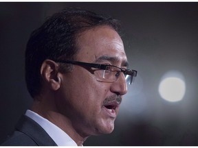 Canadian Natural Resources Minister Amarjeet Sohi fields questions about the government's plans regarding the Trans Mountain Pipeline Project, as the G7 environment, oceans and energy ministers meet in Halifax on Friday, Sept. 21, 2018. Sohi says he shares Albertan's "frustration" at billions of dollars being lost to the Canadian economy due to oil price discounts linked to export pipeline capacity constraints.