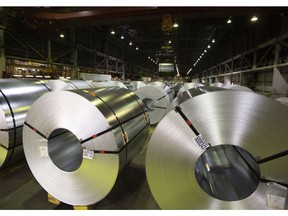 Rolls of coiled coated steel are shown at Stelco in Hamilton, Ont., on June 29, 2018. If the midterm elections were supposed to wipe clear the uncertainty of tariffs, trade and other smudges on the window into Canada-U.S. affairs, well, have a look at the bizarro world of politics in the United States of America. A Democratic majority in the House of Representatives was "very close to complete victory" for President Donald Trump. The election is both over and not over, thanks to vote-counting disputes in Florida, Georgia and Arizona. There's a new trade deal, but the White House and Canada are still staring each other down over steel and aluminum.