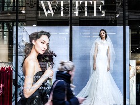 A pedestrian passes in front of a David's Bridal store in New York on Nov. 14, 2018.