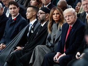U.S. President Donald Trump, first lady Melania Trump, Morocco's King Mohammed VI, his son Crown Prince Moulay, and Canadian Prime Minister Justin Trudeau attend a commemoration ceremony for Armistice Day.
