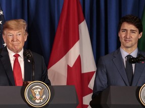 U.S. president Donald Trump, left, and Justin Trudeau, Canada's prime minister, smile during a news conference before the signing of the United States-Mexico-Canada Agreement (USMCA) at the G-20 Leaders' Summit in Buenos Aires, Argentina, on Friday Nov. 30, 2018.