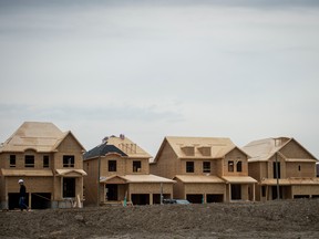 Homes under construction in Ontario. Home builders want Canada's mortgage rules to be eased since a soft landing for the housing market has been achieved.