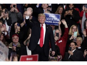 President Donald Trump speaks at a campaign rally in Indianapolis, Friday, Nov. 2, 2018.