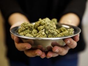A bowl of marijuana is displayed for a photograph at the MedMen dispensary in West Hollywood, California.