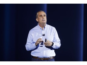 FILE- In this Jan. 8, 2018, file photo, Intel CEO Brian Krzanich delivers a keynote speech at CES International in Las Vegas.  CDK Global has named Krzanich its new president and CEO. Krzanich resigned from Intel in last summer after the company learned of what it called a past, consensual relationship with an employee. The 58-year-old Krzanich, who served as Intel's CEO from May 2013 to June 2018, replaces Brian MacDonald.