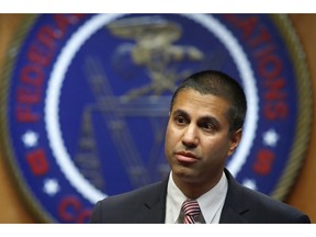 FILE - In this Dec. 14, 2017, file photo, Federal Communications Commission Chairman Ajit Pai arrives for an FCC meeting on net neutrality, in Washington. Once President Donald Trump took office, net neutrality became one of his first targets as part of broader government deregulation. The FCC chairman he appointed, Pai, made rollback a top priority.