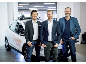 In this Nov. 20, 2018, photo provided by General Motors/Cruise, from left, Cruise Automation's Dan Kan and Kyle Vogt pose for a photo with General Motors' Dan Ammann at Cruise Automation offices in San Francisco, Calif. General Motors' No. 2 executive is moving from Motor City to Silicon Valley to run the automaker's self-driving car operations as it attempts to cash in on its bet that robotic vehicles will transform transportation. In a transition announced Thursday, Nov. 29, GM President Ammann will become CEO of the company's Cruise Automation subsidiary at the beginning of next year. He will replace Cruise co-founder Vogt, who will become chief technology officer.