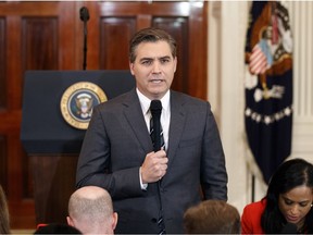 FILE - In this Nov. 7, 2018, file photo, CNN journalist Jim Acosta does a standup before a new conference with President Donald Trump in the East Room of the White House in Washington. CNN sued the Trump administration Tuesday, demanding that correspondent Jim Acosta's credentials to cover the White House be returned because it violates the constitutional right of freedom of the press.