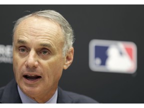 Baseball Commissioner Rob Manfred speaks during a news conference at MLB headquarters in New York, Tuesday, Nov. 27, 2018.