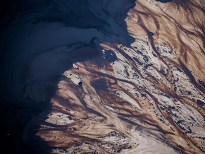 The Suncor Energy Inc. Steepbank mine is seen in this aerial photograph taken above the Athabasca oilsands near Fort McMurray, Alberta.