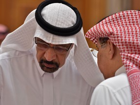 Saudi Energy and Oil Minister Khalid al-Falih, left, would need to secure the support of Russia  to also reduce output.