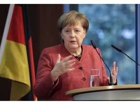 German Chancellor Angela Merkel delivers a speech during the German Ukrainian Economy Forum in Berlin, Germany, Thursday, Nov. 29, 2018.